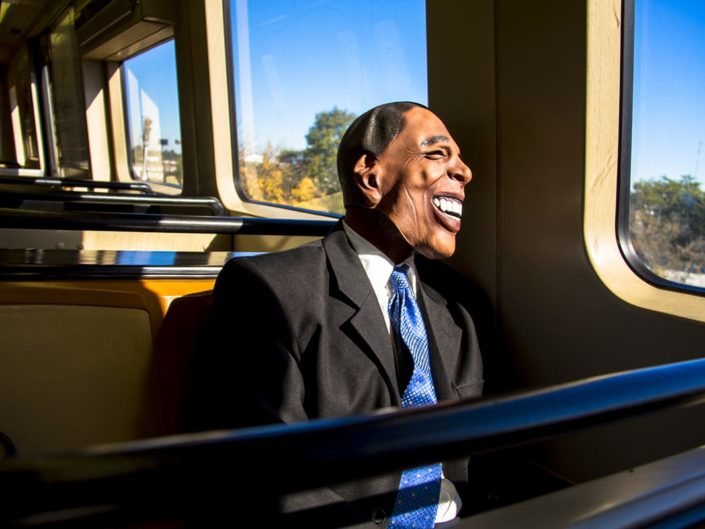 Atlanta art photographer working in portrait photography from the series Every Day Obama, wearing a President Obama mask.