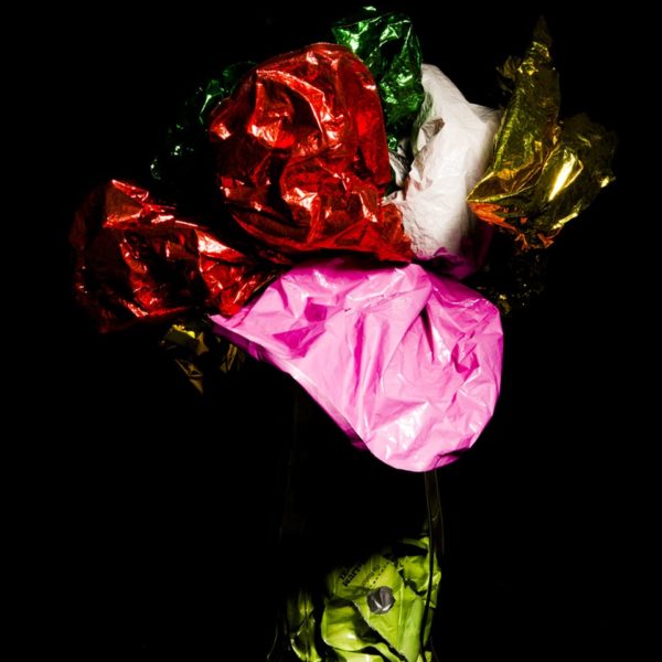 Atlanta art photographer working with balloon photography for the flower arrangement of The Rearrangement Series of balloon art.